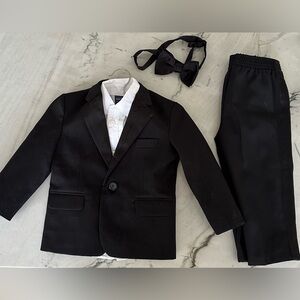 24 month tuxedo. Worn once for Christmas picture